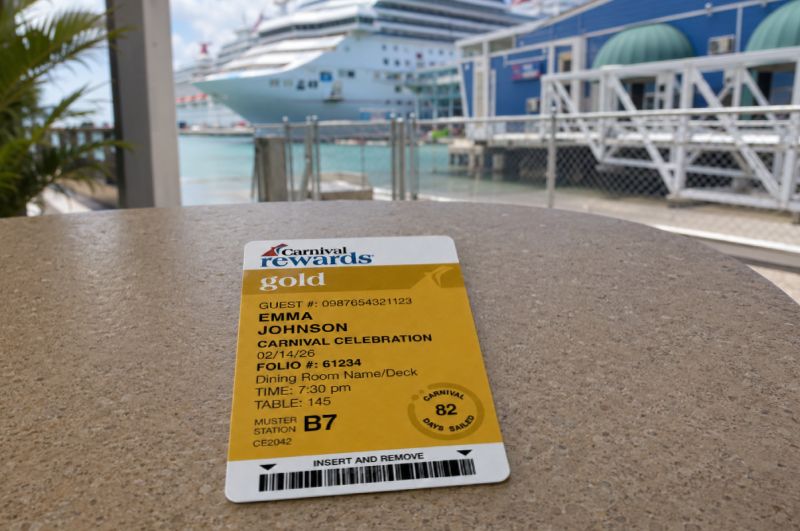 Carnival Rewards Gold Laid on Table
